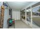 Covered front porch with seating area overlooking the front yard and neighborhood at 240 Horseshoe Dr, Goose Creek, SC 29445