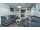 Living room featuring a fireplace, built-in shelving, TV, and neutral colors at 240 Horseshoe Dr, Goose Creek, SC 29445
