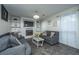 Comfortable living room with fireplace, TV, built-in shelves, and modern decor at 240 Horseshoe Dr, Goose Creek, SC 29445