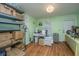 Versatile room with shelving and natural light, adaptable to different needs at 240 Horseshoe Dr, Goose Creek, SC 29445