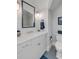 Well-appointed powder room with modern fixtures, sleek vanity and attractive accent tile at 3001 Marshall Blvd, Sullivans Island, SC 29482