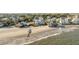 Aerial view of charming beachfront homes with private beach access and stunning ocean views on Isle of Palms at 3001 Marshall Blvd, Sullivans Island, SC 29482