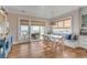 Bright breakfast nook with banquette seating and ocean views, perfect for casual dining at 3001 Marshall Blvd, Sullivans Island, SC 29482