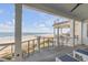 Relaxing outdoor deck space with panoramic ocean vistas, providing a serene escape at 3001 Marshall Blvd, Sullivans Island, SC 29482