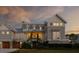 Charming exterior with elegant landscaping and a welcoming entryway adorned with climbing vines at 3001 Marshall Blvd, Sullivans Island, SC 29482