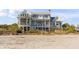 Beautiful beachfront home with multiple balconies, offering stunning ocean views at 3001 Marshall Blvd, Sullivans Island, SC 29482