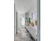Hallway with cushioned bench and beach-inspired decor at 3001 Marshall Blvd, Sullivans Island, SC 29482