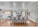 Bright, open kitchen featuring a large center island with barstool seating and modern appliances at 3001 Marshall Blvd, Sullivans Island, SC 29482