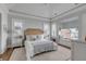 Bright main bedroom featuring a tray ceiling, beach view and a cozy window seat at 3001 Marshall Blvd, Sullivans Island, SC 29482