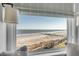 Stunning ocean view framed by a cozy window seat, creating a serene and picturesque scene at 3001 Marshall Blvd, Sullivans Island, SC 29482