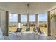 Covered patio featuring lounge seating and ocean views at 3001 Marshall Blvd, Sullivans Island, SC 29482
