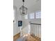 Bright stairway with decorative chandelier at 3001 Marshall Blvd, Sullivans Island, SC 29482