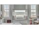 Inviting window seat in the main bedroom boasting natural light and ocean views at 3001 Marshall Blvd, Sullivans Island, SC 29482