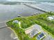 Stunning aerial view of waterfront properties, marshlands, and the scenic bridge at 325 Blowing Fresh Dr, Charleston, SC 29492
