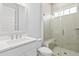 Modern bathroom featuring a glass-enclosed shower, vanity with chrome fixtures, and neutral tones at 325 Blowing Fresh Dr, Charleston, SC 29492