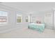 Spacious bedroom filled with light features a stylish bed and multiple windows at 325 Blowing Fresh Dr, Charleston, SC 29492