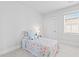 Bright bedroom featuring a nautical theme with a cozy bed and natural light at 325 Blowing Fresh Dr, Charleston, SC 29492