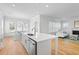 Bright and airy dining area seamlessly connecting to the kitchen and living spaces for easy flow at 325 Blowing Fresh Dr, Charleston, SC 29492