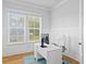 Bright home office with a large window, modern desk, and comfortable chair, ideal for remote work at 325 Blowing Fresh Dr, Charleston, SC 29492