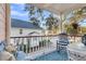 Inviting porch with comfortable seating, rocking chair, and scenic neighborhood views at 3271 Johnstowne St, Johns Island, SC 29455