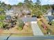 Charming home with a two-car garage and a well-maintained front yard in a tranquil neighborhood at 3360 Pinewood Dr, Ladson, SC 29456