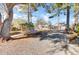 This large backyard has mature trees and includes a swimming pool at 3360 Pinewood Dr, Ladson, SC 29456