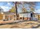 This backyard contains a chicken coop and multiple outdoor storage structures at 3360 Pinewood Dr, Ladson, SC 29456
