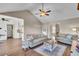 Cozy living room featuring hardwood floors, ceiling fan, neutral paint and comfortable seating at 3360 Pinewood Dr, Ladson, SC 29456