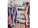Walk-in closet with shelves and rods for ample storage space at 3360 Pinewood Dr, Ladson, SC 29456
