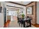 Open-concept dining room showcasing exposed beams and access to the kitchen at 36 Bogard St, Charleston, SC 29403