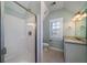 Bright bathroom featuring a walk-in shower, granite countertops and natural light at 3711 Riverstation Ct, Mount Pleasant, SC 29466