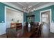 Stately dining room showcasing a chandelier and a stunning display cabinet at 3711 Riverstation Ct, Mount Pleasant, SC 29466