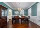 Elegant dining room with coffered ceilings, wainscoting, and classic chandelier at 3711 Riverstation Ct, Mount Pleasant, SC 29466