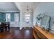 Inviting entryway featuring beautiful wood floors, modern decor, and ample natural light at 3711 Riverstation Ct, Mount Pleasant, SC 29466