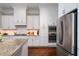 Gourmet kitchen featuring stainless steel appliances, granite counters and custom cabinets at 3711 Riverstation Ct, Mount Pleasant, SC 29466