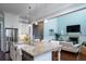 Open kitchen with a large island, stainless steel appliances, and seamless access to the living area at 3711 Riverstation Ct, Mount Pleasant, SC 29466