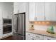 Modern kitchen featuring stainless steel appliances, ample storage, and stylish countertops at 3711 Riverstation Ct, Mount Pleasant, SC 29466