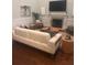 Bright living room featuring a fireplace, hardwood floors, and comfortable seating at 3711 Riverstation Ct, Mount Pleasant, SC 29466