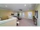 Bright living room with large windows, neutral tones, and a comfortable seating area at 3711 Riverstation Ct, Mount Pleasant, SC 29466