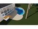 A kidney shaped pool with a sunning deck and an adjacent covered porch at 3711 Riverstation Ct, Mount Pleasant, SC 29466