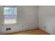 Bedroom featuring hardwood floors, window view, and natural light at 409 Dowling Ave, Walterboro, SC 29488
