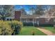 Charming single-story brick home with a well-manicured lawn and inviting front porch at 409 Dowling Ave, Walterboro, SC 29488