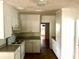 Functional kitchen with white cabinets, plenty of countertop space, and matching appliances at 411 Maplewood Dr, Walterboro, SC 29488