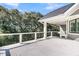 Spacious back porch offers the perfect spot to unwind and enjoy the outdoors at 4983 Sound View Dr, Mount Pleasant, SC 29466