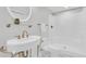 Charming bathroom with a pedestal sink, a round mirror, bronze hardware, and a separate walk-in shower at 4983 Sound View Dr, Mount Pleasant, SC 29466