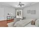 Serene bedroom with hardwood floors, neutral colors, and natural light at 4983 Sound View Dr, Mount Pleasant, SC 29466