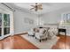 Inviting bedroom with a ceiling fan, hardwood floors, and patio access at 4983 Sound View Dr, Mount Pleasant, SC 29466