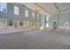 Spacious event space with high ceilings, elegant chandeliers, and ample natural light at 4983 Sound View Dr, Mount Pleasant, SC 29466