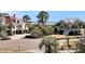 Beautiful Charleston style homes with water view, palm trees, and mature landscaping at 4983 Sound View Dr, Mount Pleasant, SC 29466