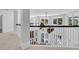 Bright open foyer with hardwood floors, winding staircase, and high ceilings at 4983 Sound View Dr, Mount Pleasant, SC 29466